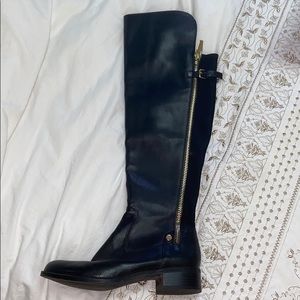 Black Calvin Klein riding boots